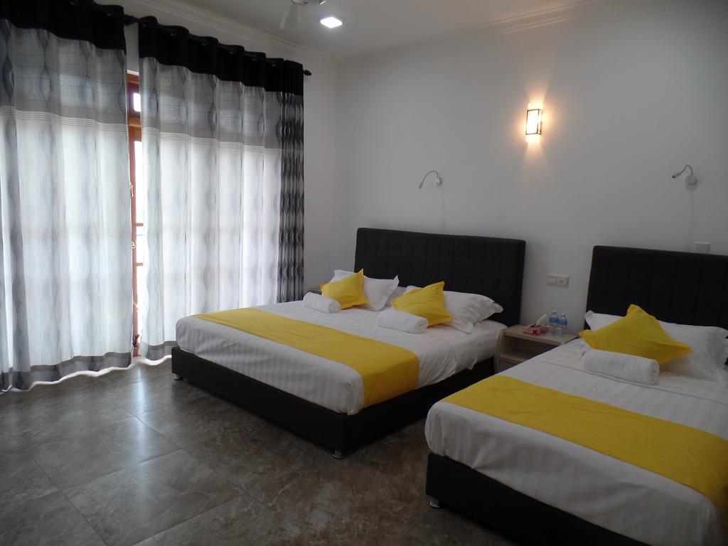 Kandyan Bluestar Villa Bilik gambar