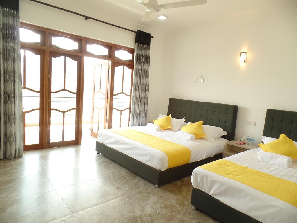 Kandyan Bluestar Villa Bilik gambar