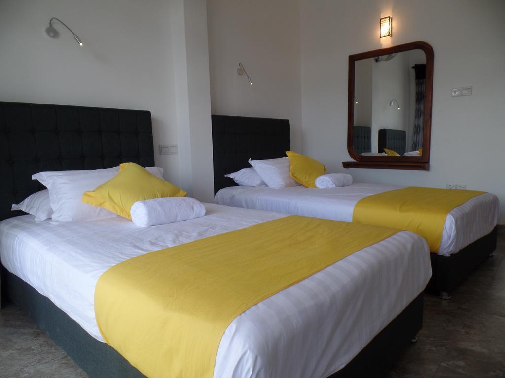 Kandyan Bluestar Villa Bilik gambar