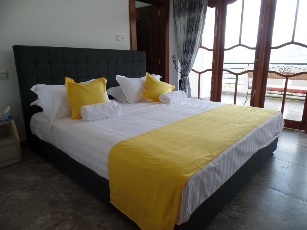 Kandyan Bluestar Villa Bilik gambar